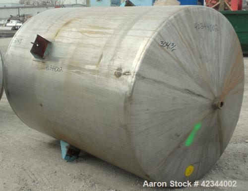 Used Tank, 750 Gallon, 304 Stainless Steel, Vertical. 56" Diameter x 70" straight side, dished 316 stainless steel top, coned bottom. Off center top entering Lightnin agitator, model N33G-150, 1-1/2"...