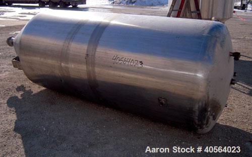 Used Tank, 850 Gallon, 304 Stainless Steel, Vertical. 49" diameter x 102" straight side. Dish top, cone bottom. Openings: top 2" tri-clamp, 2 3/8" tri-clamp; side (2) 3", 4", 4" sight glass; 5 3/4" c...