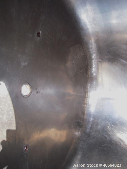 Used Tank, 850 Gallon, 304 Stainless Steel, Vertical. 49" diameter x 102" straight side. Dish top, cone bottom. Openings: top 2" tri-clamp, 2 3/8" tri-clamp; side (2) 3", 4", 4" sight glass; 5 3/4" c...