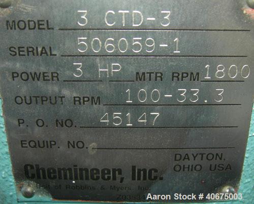 Used Tank, 700 gallon, 304 stainless steel, vertical. 58" diameter x 60" straight side. Open top, no cover, coned bottom. Off center bolt on carbon steel agitator bridge with a Chemineer agitator, mo...