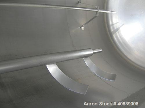 Used Tank, 950 Gallon, 316 Stainless Steel, Vertical. 64" Diameter x 64" straight side, dished top and bottom. (2) Finger up baffle. Openings top 18" manway with cover, (2) 4", 8", (2) 2-1/2", 4-1/2"...