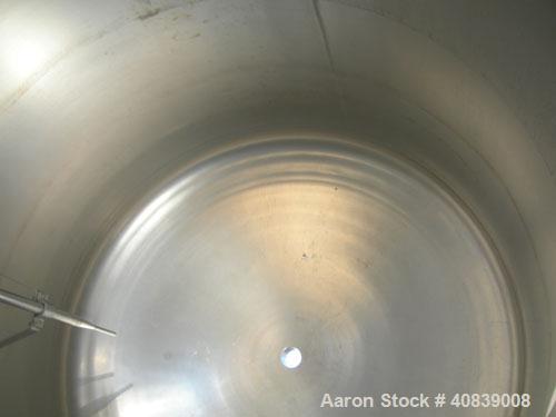 Used Tank, 950 Gallon, 316 Stainless Steel, Vertical. 64" Diameter x 64" straight side, dished top and bottom. (2) Finger up baffle. Openings top 18" manway with cover, (2) 4", 8", (2) 2-1/2", 4-1/2"...