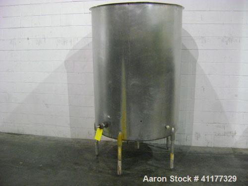 Used Tank, 500 Gallon, Stainless Steel, Vertical. 47" diameter x 66" straight side, open top, sloped bottom. Side bottom 3 blade prop, no drive. Off center bottom outlet. Mounted on 4 legs.