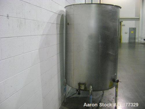 Used Tank, 500 Gallon, Stainless Steel, Vertical. 47" diameter x 66" straight side, open top, sloped bottom. Side bottom 3 blade prop, no drive. Off center bottom outlet. Mounted on 4 legs.
