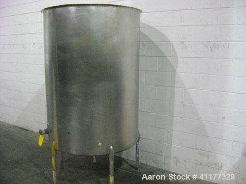 Used Tank, 500 Gallon, Stainless Steel, Vertical. 47" diameter x 66" straight side, open top, sloped bottom. Side bottom 3 blade prop, no drive. Off center bottom outlet. Mounted on 4 legs.