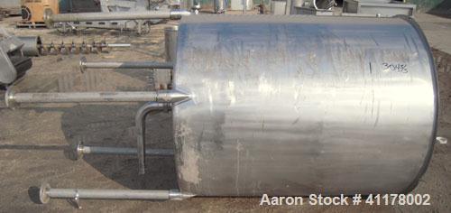 Used Tank, 600 Gallon, 304 Stainless Steel, Vertical. 54" diameter x 60" straight side. Open top with 1 piece hinged cover, slight dish bottom. 3-1/2" NPT center bottom outlet. Mounted on 5 stainless...