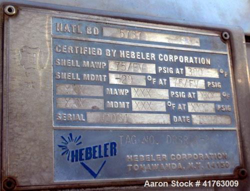 Used Hebeler Pressure Tank, 940 Gallons, 316L Stainless Steel, Horizontal. 42’’ diameter x 144’’ straight side, 2 to 1 elliptical heads. Internal rated 75/FV psi at 300 deg.f., and –20 deg.f. at 75/F...