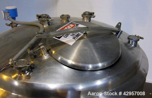 Used Tank, 500 Gallon, 316 Stainless Steel, Vertical. 52" Diameter x 55" straight side, dished top, coned bottom. Insulated with stainless steel sheathing. (2) Spray balls. Openings top 18" man way w...