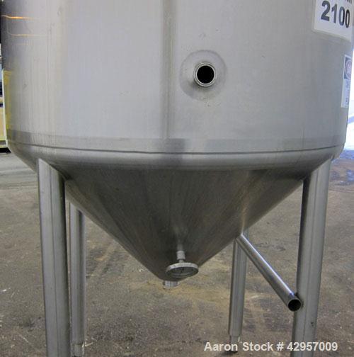 Used Tank, 500 Gallon, 316 Stainless Steel, Vertical. Dish top, insulated coned bottom. (2) Spray balls. Openings top 18" man way with cover, (3) 3" tri-clamp, (2) 2-1/2” tri-clamp, side 2” tri-clamp...