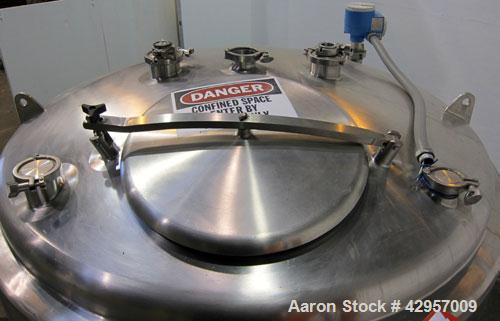 Used Tank, 500 Gallon, 316 Stainless Steel, Vertical. Dish top, insulated coned bottom. (2) Spray balls. Openings top 18" man way with cover, (3) 3" tri-clamp, (2) 2-1/2” tri-clamp, side 2” tri-clamp...