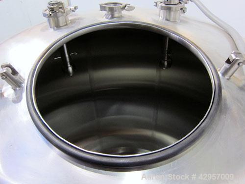 Used Tank, 500 Gallon, 316 Stainless Steel, Vertical. Dish top, insulated coned bottom. (2) Spray balls. Openings top 18" man way with cover, (3) 3" tri-clamp, (2) 2-1/2” tri-clamp, side 2” tri-clamp...