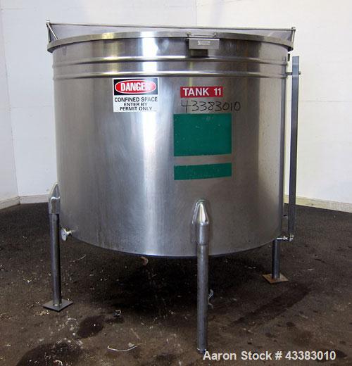 Used- Tank, 580 Gallon, 304 Stainless Steel, Vertical. Approximate 62” diameter x 45” straight side, flat top with a bolt on...