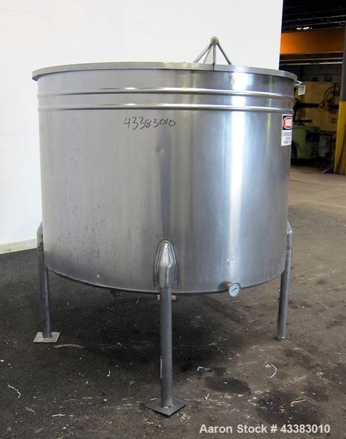 Used Tank, 580 Gallon, 304 Stainless Steel, Vertical. Approximate 62” diameter x 45” straight side, flat top with a bolt on cover with a 1/3 hinged opening, sloped bottom. Side bottom entering agitat...