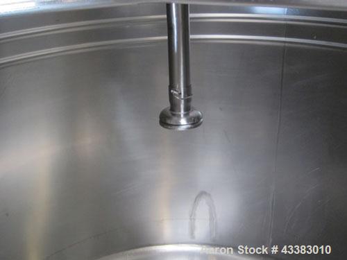 Used Tank, 580 Gallon, 304 Stainless Steel, Vertical. Approximate 62” diameter x 45” straight side, flat top with a bolt on cover with a 1/3 hinged opening, sloped bottom. Side bottom entering agitat...