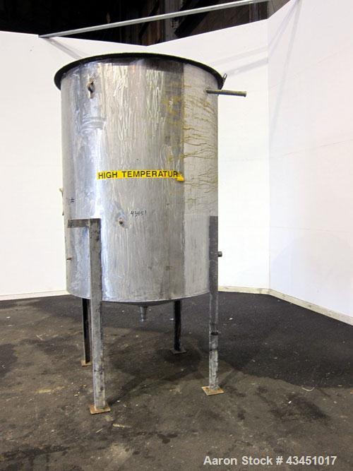 Used Tank, 750 Gallon, 304 Stainless Steel, Vertical. Approximate 55" diameter x 72" straight side. Open top, no cover, coned bottom. 2-1/2" Center bottom outlet. Mounted on 4 carbon steel legs, appr...