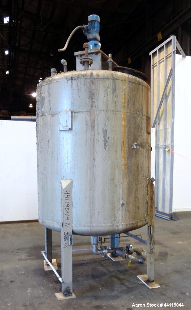 Used Tank, 750 Gallon, 316 Stainless Steel, Vertical. Approximate 60" diameter x 63" straight side, dished top and bottom. Top entering Chemineer agitator, serial# 550948-1. Approximate 1-1/2" diamet...