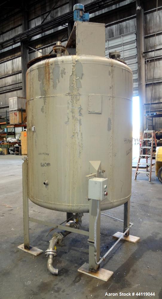 Used Tank, 750 Gallon, 316 Stainless Steel, Vertical. Approximate 60" diameter x 63" straight side, dished top and bottom. Top entering Chemineer agitator, serial# 550948-1. Approximate 1-1/2" diamet...
