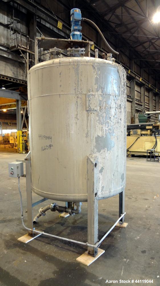 Used Tank, 750 Gallon, 316 Stainless Steel, Vertical. Approximate 60" diameter x 63" straight side, dished top and bottom. Top entering Chemineer agitator, serial# 550948-1. Approximate 1-1/2" diamet...