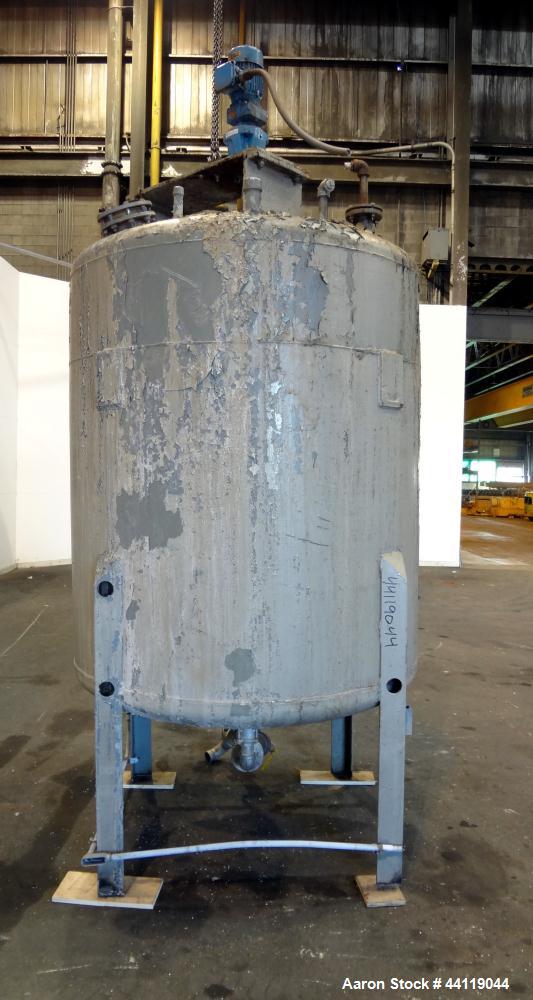 Used Tank, 750 Gallon, 316 Stainless Steel, Vertical. Approximate 60" diameter x 63" straight side, dished top and bottom. Top entering Chemineer agitator, serial# 550948-1. Approximate 1-1/2" diamet...