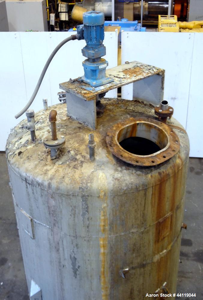 Used Tank, 750 Gallon, 316 Stainless Steel, Vertical. Approximate 60" diameter x 63" straight side, dished top and bottom. Top entering Chemineer agitator, serial# 550948-1. Approximate 1-1/2" diamet...