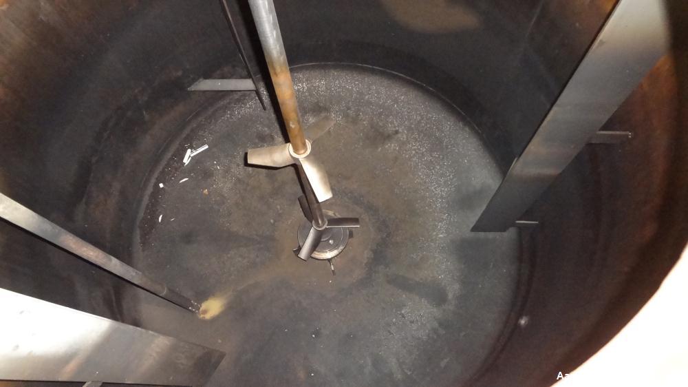 Used Tank, 750 Gallon, 316 Stainless Steel, Vertical. Approximate 60" diameter x 63" straight side, dished top and bottom. Top entering Chemineer agitator, serial# 550948-1. Approximate 1-1/2" diamet...