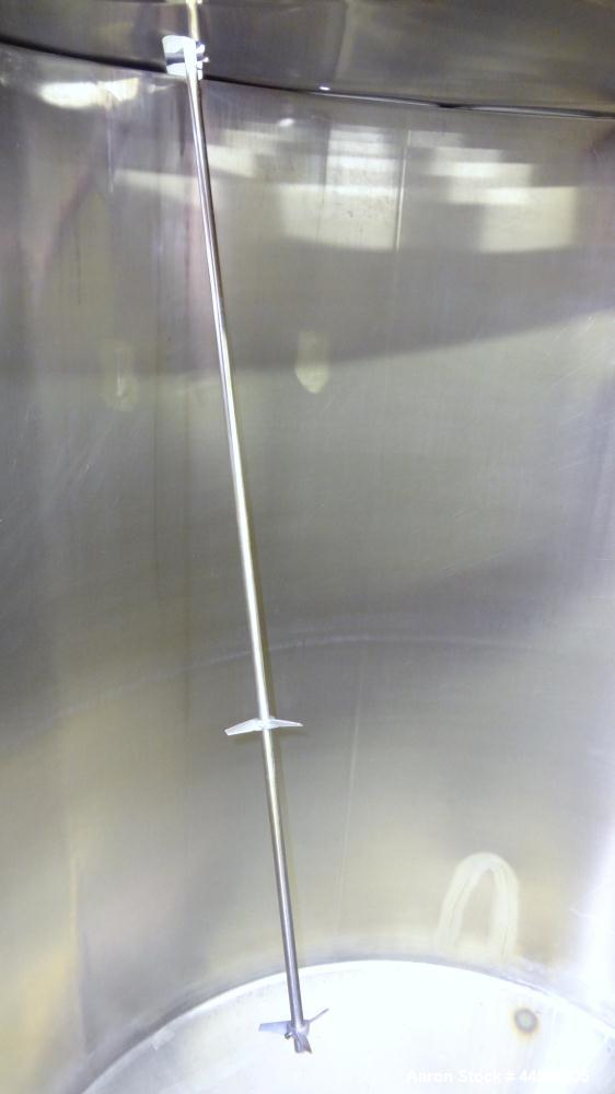 Used Perma-San Tank, 525 Gallon, Model OVS, 316 Stainless Steel, Vertical. Approximate 52” diameter x 58” straight side, Open top with (2) 1/3 hinged covers, sloped bottom. Clamp on Lightnin agitator...