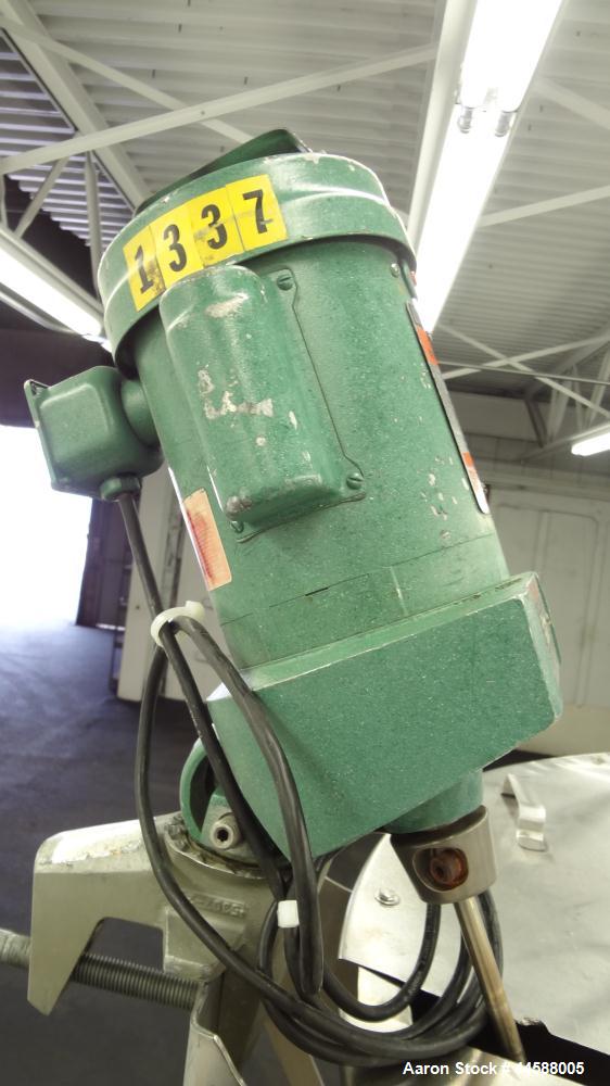 Used Perma-San Tank, 525 Gallon, Model OVS, 316 Stainless Steel, Vertical. Approximate 52” diameter x 58” straight side, Open top with (2) 1/3 hinged covers, sloped bottom. Clamp on Lightnin agitator...