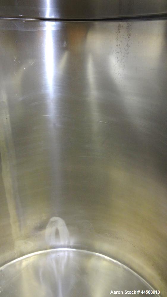 Used Perma-San Tank, 525 Gallons, Model OVS, 316 Stainless Steel, Vertical. Approximately 52” diameter x 58” straight side, open top with (2) 1/3 covers, sloped bottom.  Provision for a clamp-on agit...