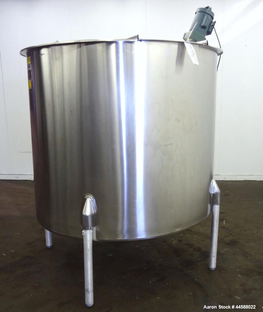 Used Perma-San Tank, 650 Gallons, Model OVS, 316 Stainless Steel, Vertical. Approximately 62" diameter x 51" straight side, open top with (2) 1/3 covers, sloped bottom. Lightnin clamp-on agitator, mo...