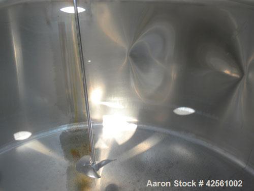 Used St. Regis Tank, Approximately 500 Gallon, 316 Stainless Steel, Vertical. 66" Diameter x 30" straight side, slight cone top and bottom. Lightnin clamp on agitator, model ND-1A. 1/2" Diameter shaf...