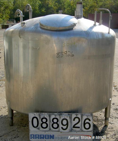 USED: St Regis tank, 500 gallon, 304 stainless steel, vertical. 66" diameter x 39" straight side, elliptical top, inverted dish bottom. (1) Spray ball. Openings: top (3) 1-7/8" NPT, 18" manway with c...