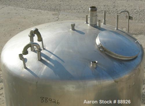 USED: St Regis tank, 500 gallon, 304 stainless steel, vertical. 66" diameter x 39" straight side, elliptical top, inverted dish bottom. (1) Spray ball. Openings: top (3) 1-7/8" NPT, 18" manway with c...
