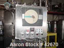 Used TCI Superior Aseptic Pressure Tank, 400 Gallon, Stainless Steel, Vertical. Approximately 48" diameter x 52" straight side. Dish top and bottom, rated 60 psi and FV at 300 deg F. Top manway, 3" c...