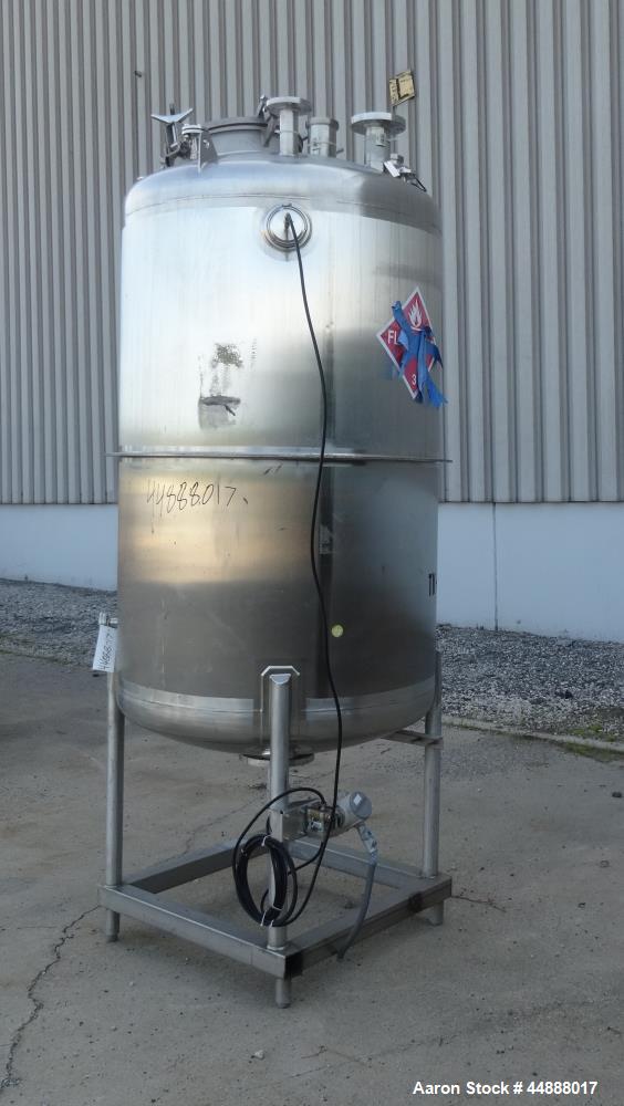 Used Tiger Steel Pressure Tank, 500 Gallon, 304L Stainless Steel, Vertical. 45" Diameter x 67" straight side, dished top & bottom. Internal rated 15psi/Full Vacuum at 350 degrees F. Openings top 1", ...