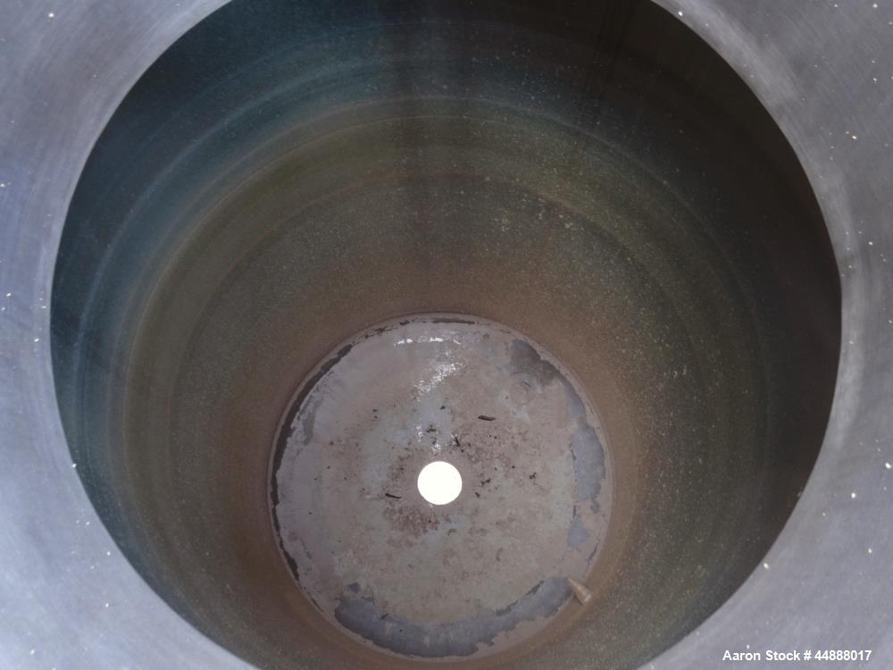 Used Tiger Steel Pressure Tank, 500 Gallon, 304L Stainless Steel, Vertical. 45" Diameter x 67" straight side, dished top & bottom. Internal rated 15psi/Full Vacuum at 350 degrees F. Openings top 1", ...