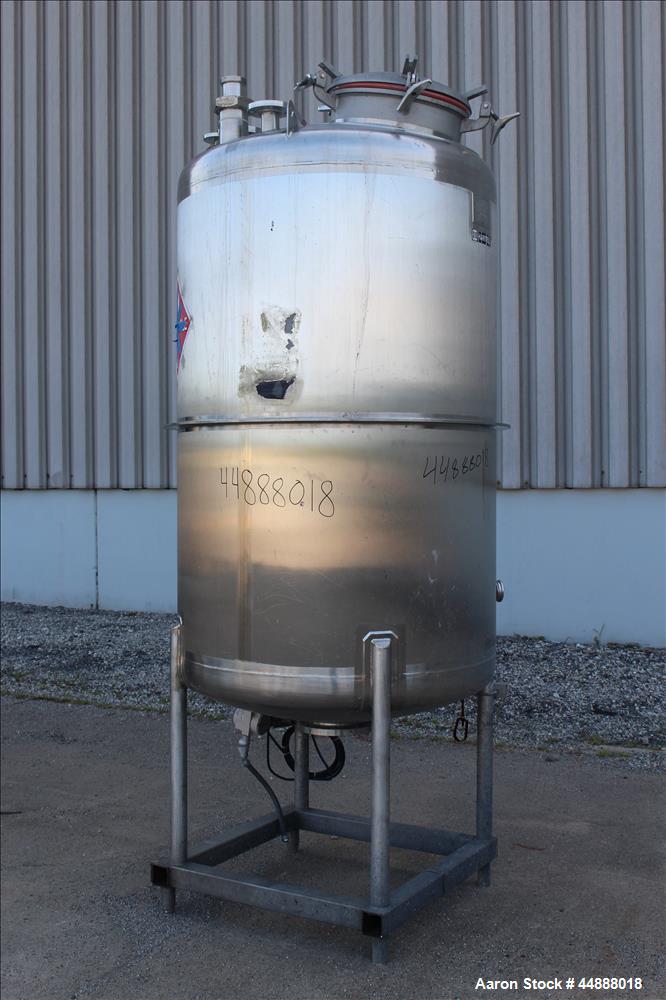 Used Tiger Steel Pressure Tank, 500 Gallon, 304L Stainless Steel, Vertical. 45" Diameter x 67" straight side, dished top & bottom. Internal rated 15psi/Full Vacuum at 350 degrees F. Openings top 1", ...