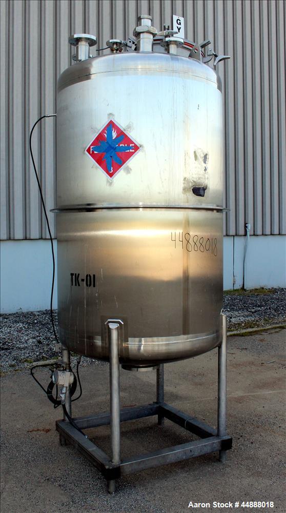 Used Tiger Steel Pressure Tank, 500 Gallon, 304L Stainless Steel, Vertical. 45" Diameter x 67" straight side, dished top & bottom. Internal rated 15psi/Full Vacuum at 350 degrees F. Openings top 1", ...