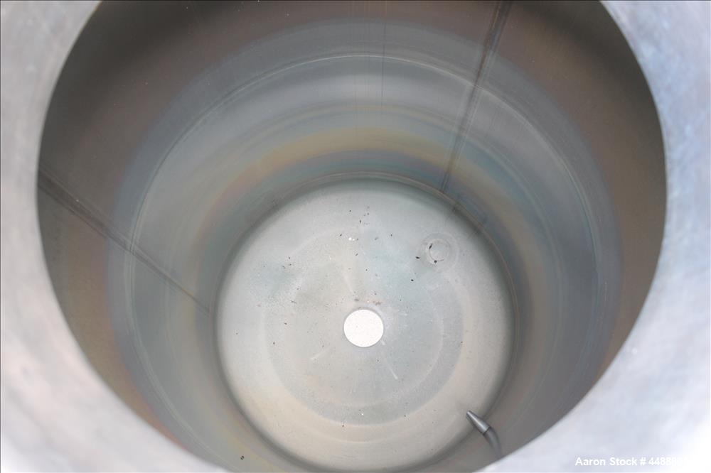 Used Tiger Steel Pressure Tank, 500 Gallon, 304L Stainless Steel, Vertical. 45" Diameter x 67" straight side, dished top & bottom. Internal rated 15psi/Full Vacuum at 350 degrees F. Openings top 1", ...