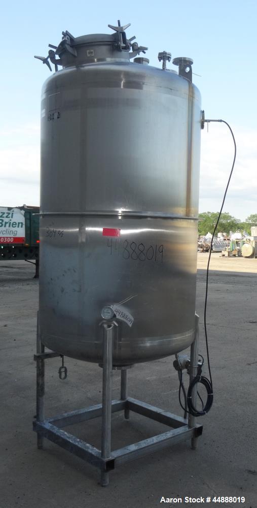 Used Tiger Steel Pressure Tank, 500 Gallon, 304L Stainless Steel, Vertical. 45" Diameter x 67" straight side, dished top & bottom. Internal rated 15psi/Full Vacuum at 350 degrees F. Openings top 1", ...