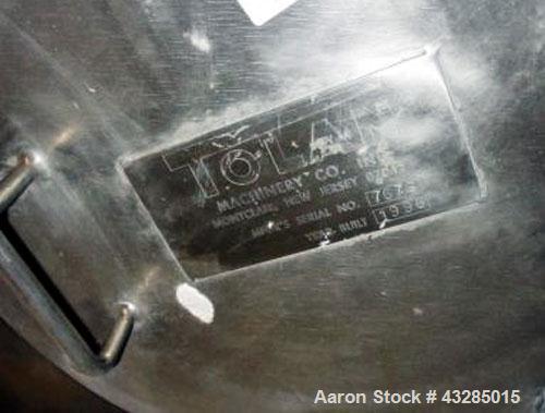 Used Tolan Tank, 850 Gallon, Stainless Steel. 48” Diameter x 108” straight side, flat top, dish bottom.  2" Center bottom outlet. Mounted on legs.