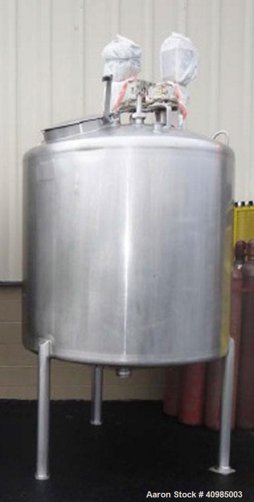Used Walker 304 Stainless Steel 500 Gallon Dual Agitation Tank, Model M1X Sp-18689-C.  Built 1990.  (1) 3" Tri-clamp outlet.  (1) 2" Tri-clamp inlet on dome.  (1) 1 1/2" Tri-clamp spray ball.