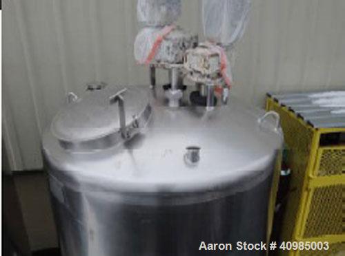 Used Walker 304 Stainless Steel 500 Gallon Dual Agitation Tank, Model M1X Sp-18689-C.  Built 1990.  (1) 3" Tri-clamp outlet.  (1) 2" Tri-clamp inlet on dome.  (1) 1 1/2" Tri-clamp spray ball.