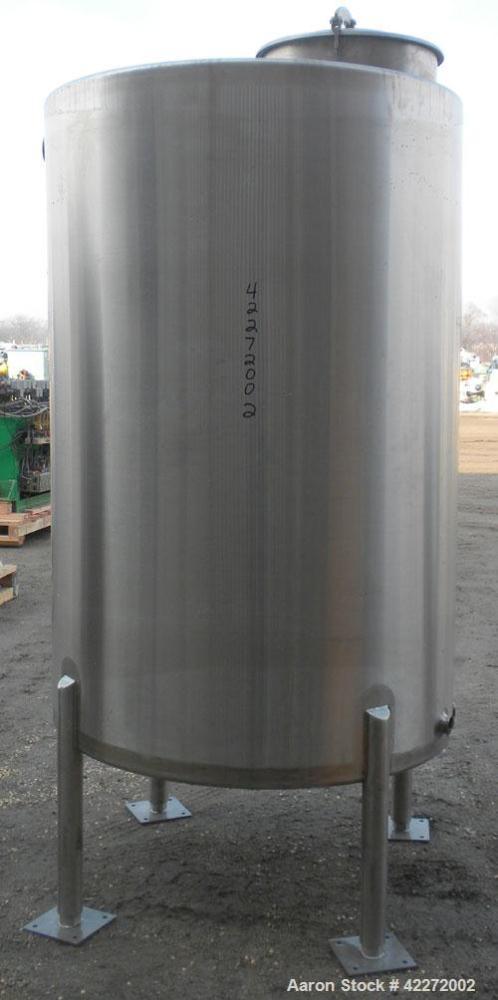 Unused- Walker Tank, 550 Gallon, 304 Stainless Steel, Vertical. 48" diameter x 70" straight side. Flat top, sloped bottom. (1) Spray ball. Openings top 1-1/2" tri-clamp, (2) 3" tri-clamp, 19" manway ...