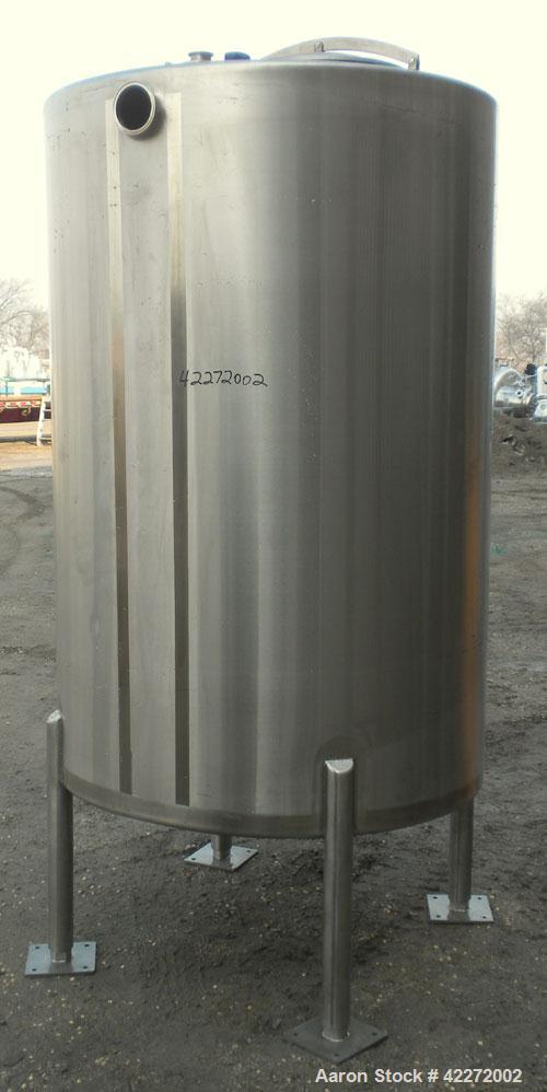Unused- Walker Tank, 550 Gallon, 304 Stainless Steel, Vertical. 48" diameter x 70" straight side. Flat top, sloped bottom. (1) Spray ball. Openings top 1-1/2" tri-clamp, (2) 3" tri-clamp, 19" manway ...