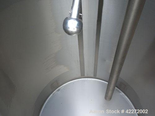Unused- Walker Tank, 550 Gallon, 304 Stainless Steel, Vertical. 48" diameter x 70" straight side. Flat top, sloped bottom. (1) Spray ball. Openings top 1-1/2" tri-clamp, (2) 3" tri-clamp, 19" manway ...