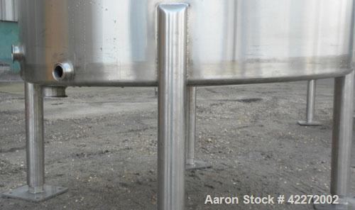Unused- Walker Tank, 550 Gallon, 304 Stainless Steel, Vertical. 48" diameter x 70" straight side. Flat top, sloped bottom. (1) Spray ball. Openings top 1-1/2" tri-clamp, (2) 3" tri-clamp, 19" manway ...