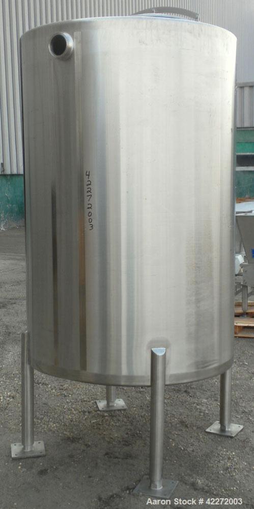 Unused- Walker Tank, 550 Gallon, 304 Stainless Steel, Vertical. 48" diameter x 70" straight side. Flat top, sloped bottom. (1) Spray ball. Openings top 1-1/2" tri-clamp, (2) 3" tri-clamp, 19" manway ...