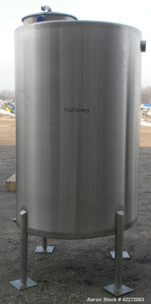 Unused- Walker Tank, 550 Gallon, 304 Stainless Steel, Vertical. 48" diameter x 70" straight side. Flat top, sloped bottom. (1) Spray ball. Openings top 1-1/2" tri-clamp, (2) 3" tri-clamp, 19" manway ...