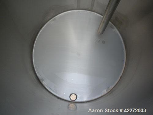 Unused- Walker Tank, 550 Gallon, 304 Stainless Steel, Vertical. 48" diameter x 70" straight side. Flat top, sloped bottom. (1) Spray ball. Openings top 1-1/2" tri-clamp, (2) 3" tri-clamp, 19" manway ...