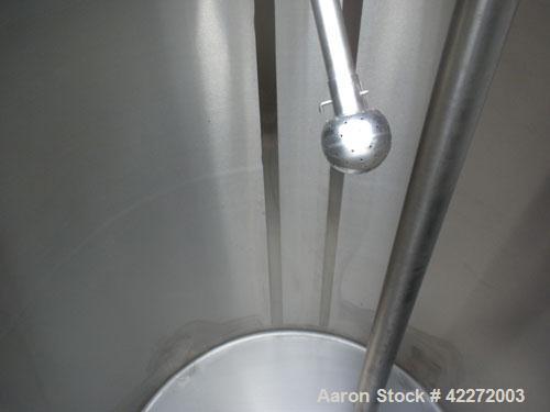 Unused- Walker Tank, 550 Gallon, 304 Stainless Steel, Vertical. 48" diameter x 70" straight side. Flat top, sloped bottom. (1) Spray ball. Openings top 1-1/2" tri-clamp, (2) 3" tri-clamp, 19" manway ...